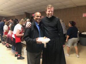 Fr. Kurtis Wiedenfeld with another church pastor at the 2021 Turkey Fundraiser